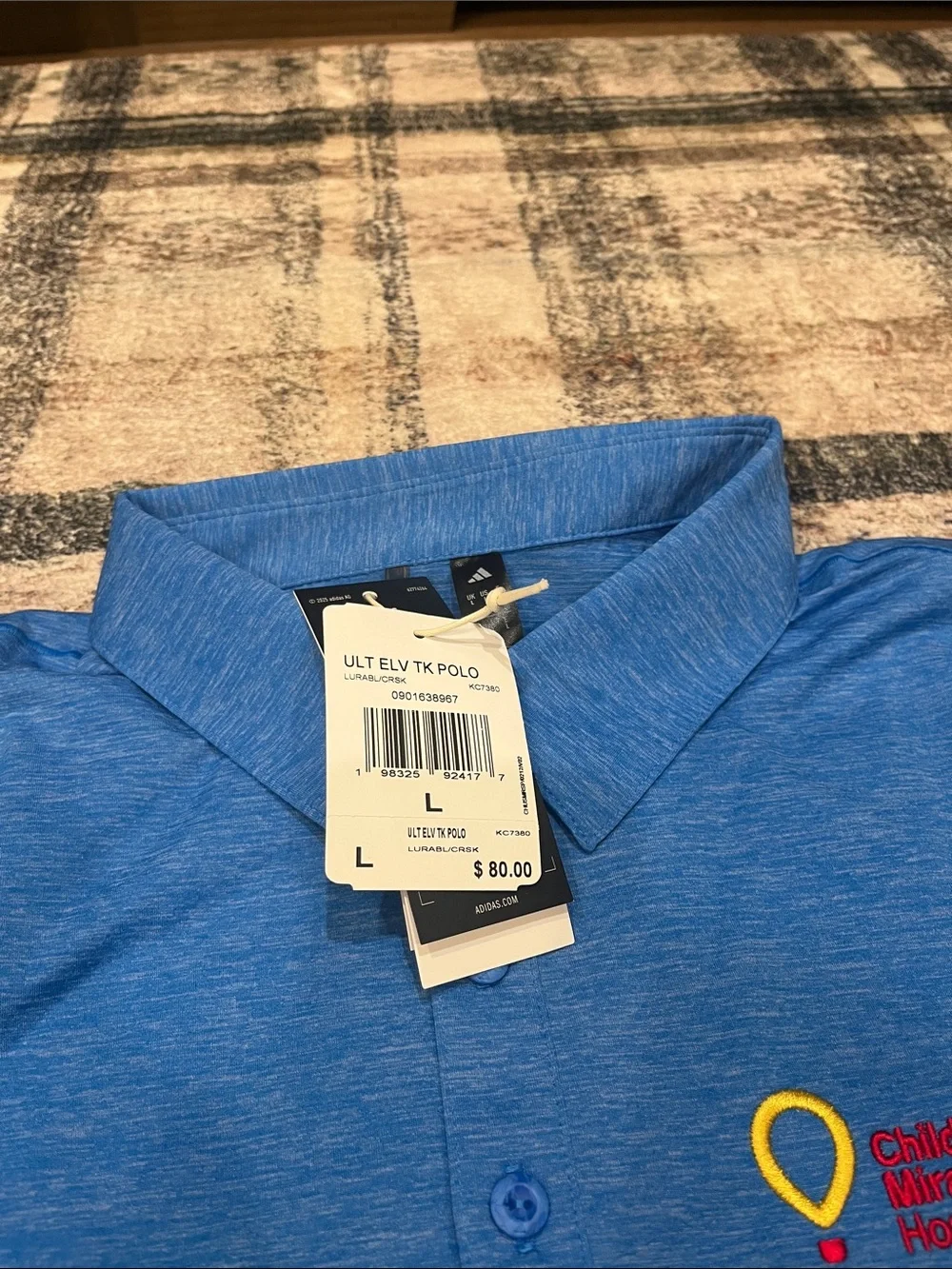adidas Blue Heather Polo with Children’s miracle network logo
